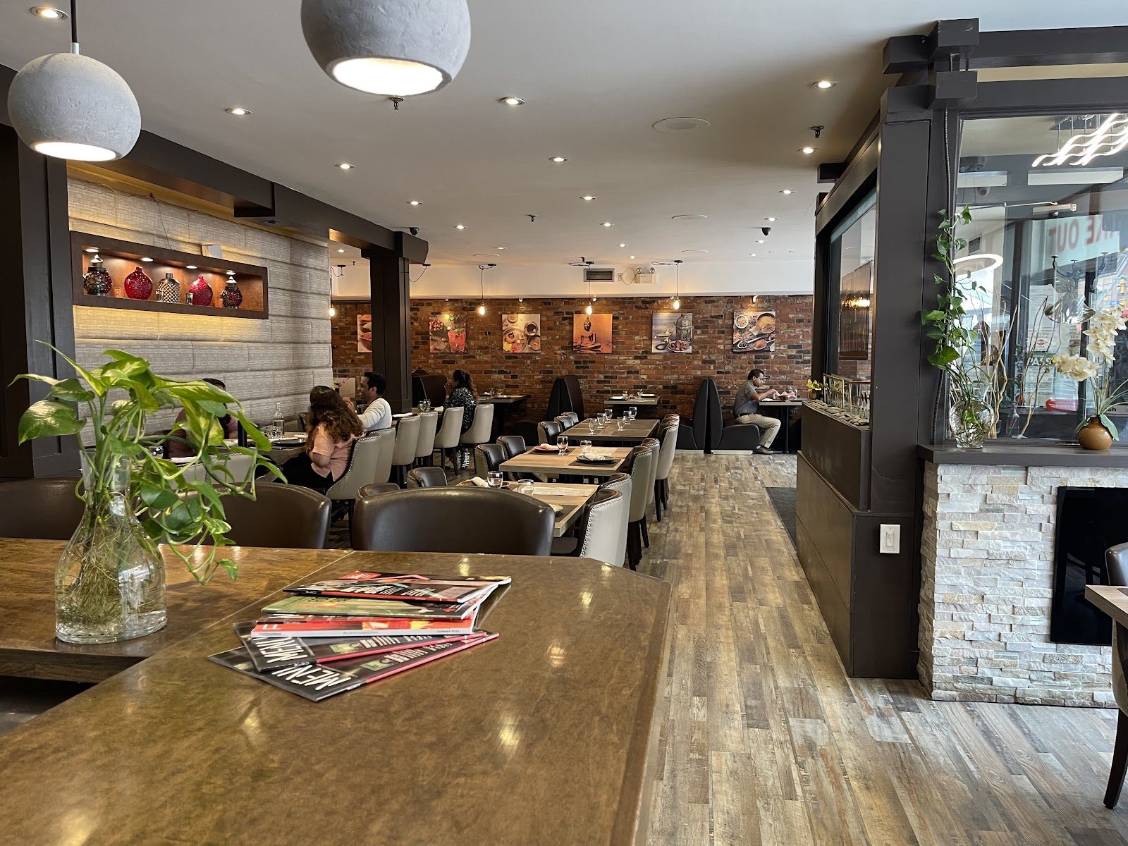 Exposed-brick dining room at Aafrien Indian Restaurant